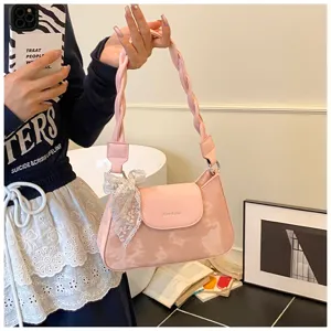 Sac à bandoulière rose pour femme, sac à main tressé élégant avec joli nœud.
