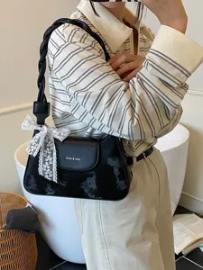 Sac à épaule élégant pour femme en cuir PU noir sac sous les bras avec poignée tressée nœud