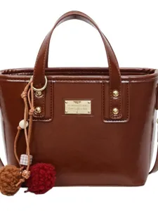 Brown PU leather women handbag bucket bag with stylish metal plate and fluffy pompom charms.