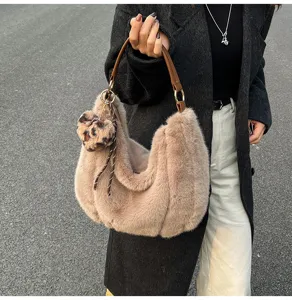 Autumn winter fluffy shoulder bag large capacity casual furry armpit bag with leopard charm.