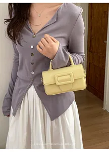 Minimalist retro women's yellow crossbody bag, stylish small square handbag with a chic square buckle.