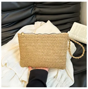 Gevlochten strooien clutch tas voor dames, zomer strand vakantie handtas met rits en polsband.