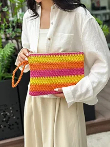 Chique zomerse strand geweven stro clutch tas voor vrouwen, stijlvolle gestreepte oranje handtas.