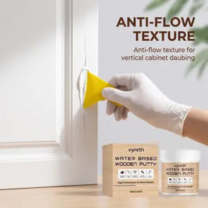 Dettaglio dello stucco per legno su fessura di armadio con strumento per superficie liscia.