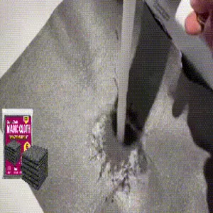 Microfiber cleaning cloth detail wiping demonstration scene showing high absorption capacity.