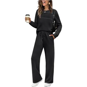 Women casual two piece set long sleeve crewneck top and wide leg pants activewear.