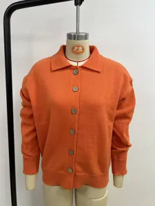Solid color orange knitted cardigan for women, featuring lapel collar and button-up closure.