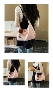 Pink slouchy shoulder bag for women, large capacity casual hobo tote with cute plush charm.