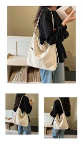 Large capacity soft leather shoulder bag for women, casual commuter handbag with stylish design.
