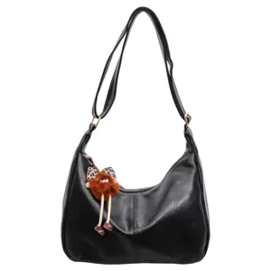 Black leather shoulder bag for women, stylish large capacity hobo tote with cute plush charm.