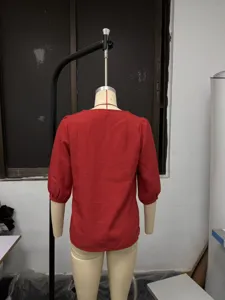 Back detail view of casual solid color square neck lace-spliced 3/4 sleeve linen top woman