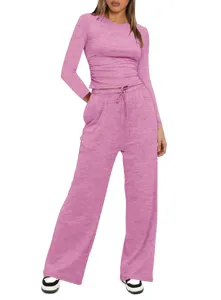 Pink long sleeve top high waist wide leg pants lounge set detail view showing comfortable fabric.