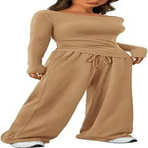 Casual two-piece set featuring an asymmetric long sleeve top and wide leg trousers.