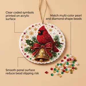 DIY red cardinal diamond painting pendant with pearls and beads for home decor detailing.