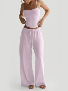 Casual pink camisole and wide-leg lounge pants set for women, featuring a crop top design.