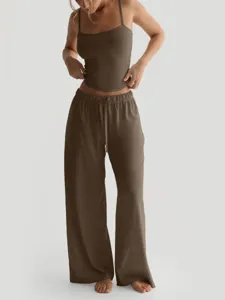 Detailed view of women casual lounge wear set, brown crop tank top and wide leg pants.