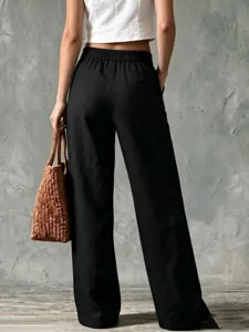 Schwarze Damen Freizeithose aus Baumwolle und Leinen mit weitem Bein für den Sommer.