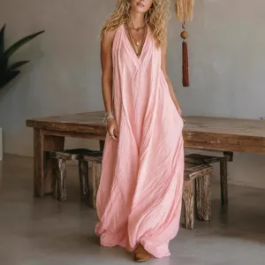 Vestido largo casual sin mangas y holgado con bolsillos para mujer en color rosa suave.