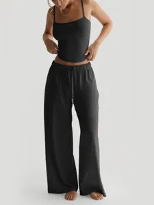 Detailed view of the women casual crop camisole and wide leg lounge pants in black color.