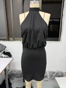Black sleeveless halter neck bodycon mini dress featuring a sexy backless and slim fit design.