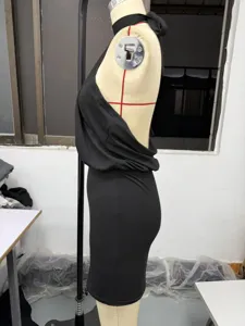 Black halter backless dress detail shot, sexy slim fit bodycon dress side view display.