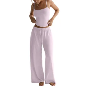 Women's pink camisole crop top and matching wide-leg lounge pants casual two-piece set.