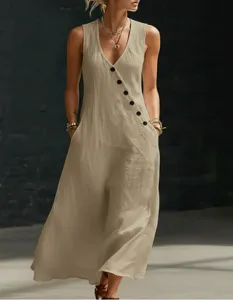 Casual sleeveless V-neck maxi dress featuring diagonal button closure and practical side pockets.