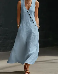 Detail view of a light blue sleeveless V-neck maxi dress featuring chic asymmetric button details.