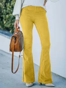 Yellow corduroy flared pants detail, high waist design, casual slim fit trousers.