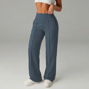 Pantaloni donna a vita alta gamba larga con piega centrale elastici vista dettagliata.