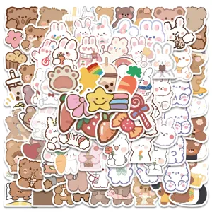Close-up detail of cute cartoon stickers pack featuring adorable bears and rabbits for DIY decor.