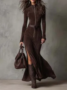 Elegant brown suede long-sleeve dress detail showcasing the chic front zipper and slit.