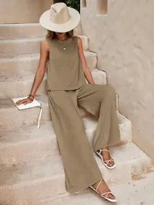 Casual solid color two-piece set featuring a sleeveless round neck top and wide leg pants.
