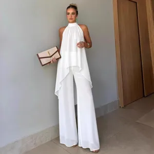 Completo bianco donna con top smanicato collo halter e pantaloni larghi moda estiva casual