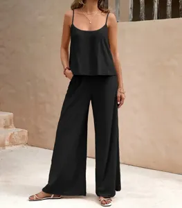 Details of the elegant solid color sleeveless camisole and wide leg pants two-piece set.