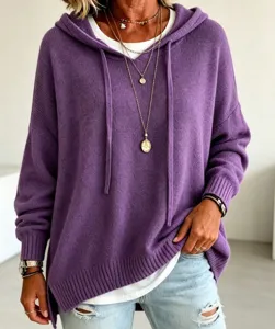Detailed view of a stylish purple knit hooded sweater with long sleeves and drawstring.