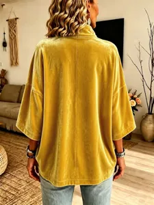 Vista posteriore top velluto donna manica 3/4 collo alto casual largo autunno inverno camicia