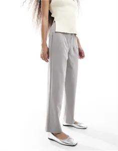 Detail shot of women's high-waisted straight trousers in grey, perfect for office and casual wear.