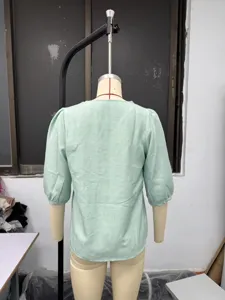 Back view detail of light green cotton linen casual square neck short sleeve top for women.