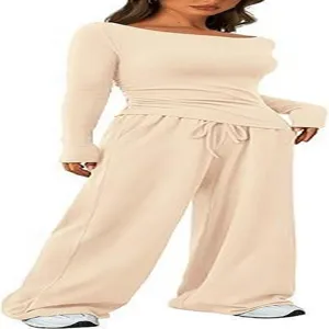 Detail view of the asymmetric long sleeve top and wide leg pants loungewear set in beige.