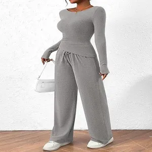 Grey ribbed long sleeve asymmetrical top and wide leg pants two piece lounge set detail