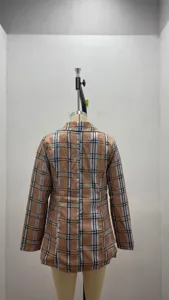 Back detail view of women's fashion plaid blazer, classic check pattern, slim lapel jacket.