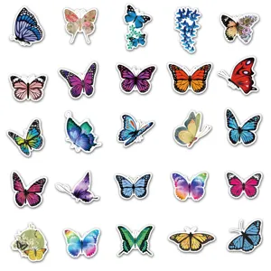 Autocollants de papillons colorés avec designs artistiques pour valise et ordinateur portable.