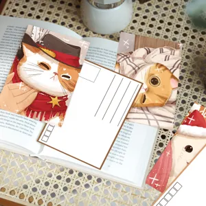Close-up details of cute cat illustrated postcards showcasing artistic pet designs.