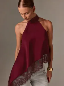 Ärmelloses Satin-Haltertop mit elegantem Spitzen-Patchwork-Saum für stilvolle Sommer-Damenmode.