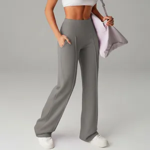 Pantaloni casual grigi a vita alta da donna, con pieghe centrali e tasche laterali pratiche.