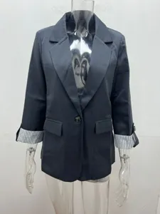 Women slim fit casual blazer jacket with striped roll sleeves and single button closure detail.