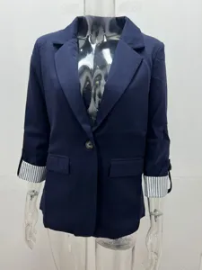 Detailed view of the women's casual blazer showing the stylish rolled striped cuffs and lapel.