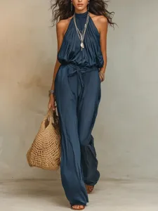 Sleeveless halter neck wide leg jumpsuit, bohemian style tied waist long pants for women.