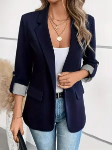Detail view of casual navy blue women's blazer jacket featuring rolled striped sleeves.